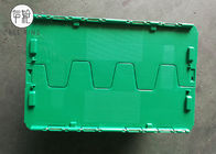 Aufbereitete grüne Plastikmagazine mit den Deckeln schwenkbar gelagert, befestigter Deckel-Behälter 500 x 330 x 236mm